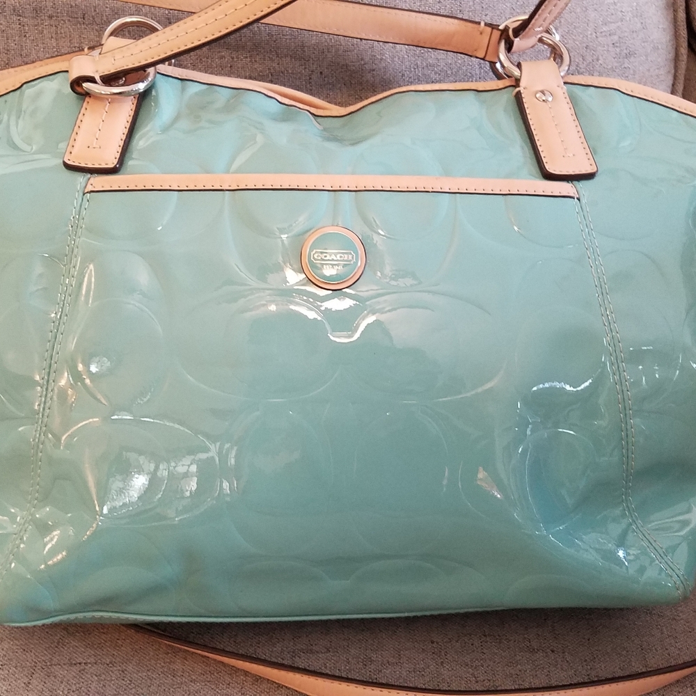 Coach teal pocket tote.